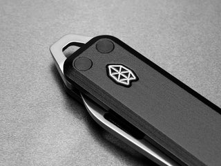 The pry bar of The Elko EDC keychain slip joint folding pocket knife.