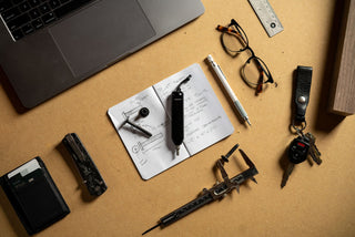 The Warrick EDC bit driver in black on a work bench.