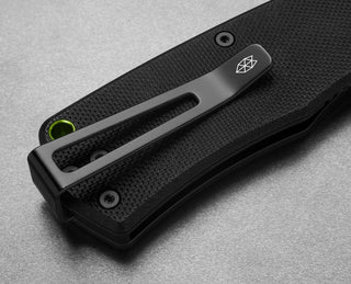 The clip of The Folsom EDC liner lock folding pocket knife with a black handle.