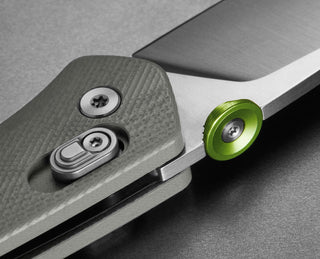 A detail of The Carter EDC slide lock folding pocket knife in primer gray.