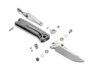 An exploded view of The Barnes integral EDC titanium folding frame lock pocket knife.