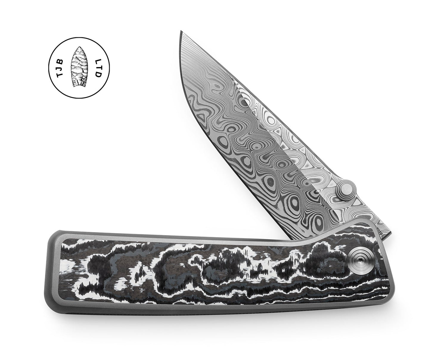 The Barnes integral titanium pocket knife with snow carbon scales and a Damasteel blade.
