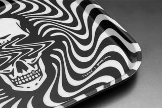The Bryce Wong artist series cambro tray on a steel surface.