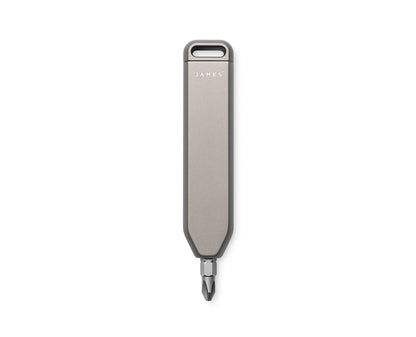 The Warrick EDC screwdriver bit driver in coyote tan open vertically orientated.