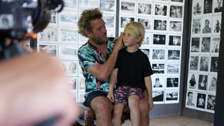 Professional skateboarder and photographer Arto Saari with his son.