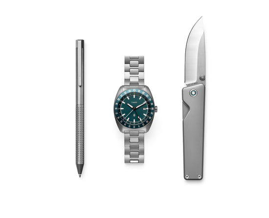 The TJB x Timex Daily Essential Capsule with a titanium pen, watch, and pocket knife.