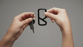 A video showing the dual compartment of The Mehlville EDC keychain carabiner in use.