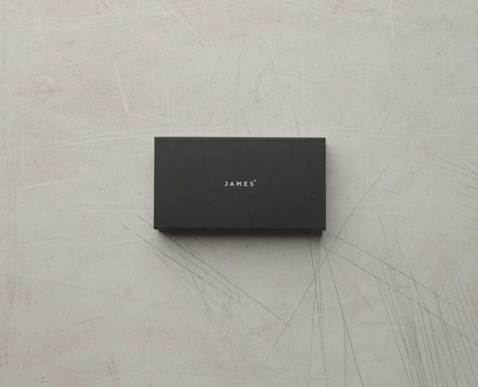 A man unboxing the Folsom Pro pocket knife.